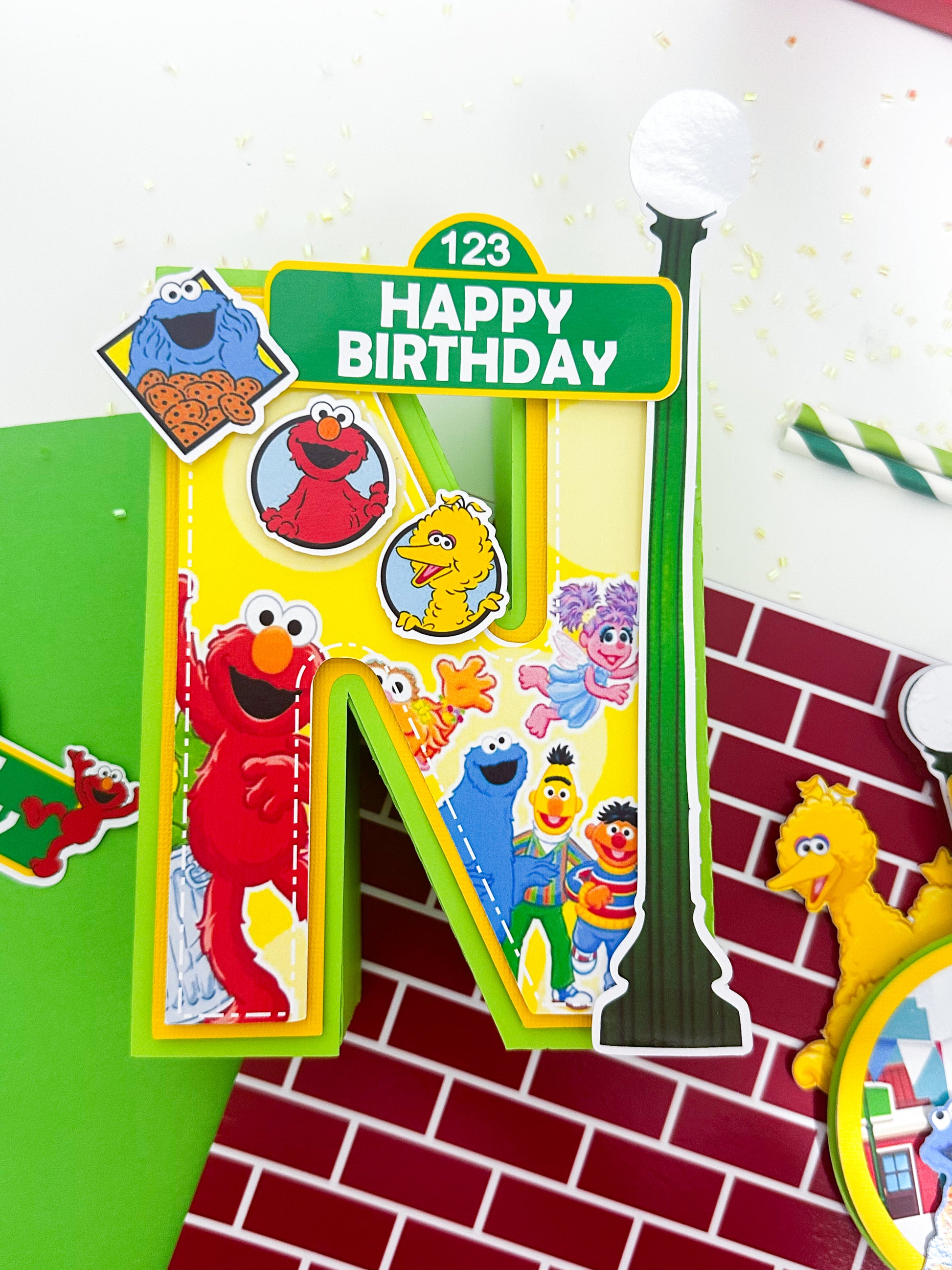 Sesame Street birthday centerpiece decoration

Sesame Street cake topper party decor

Sesame Street favor box birthday party